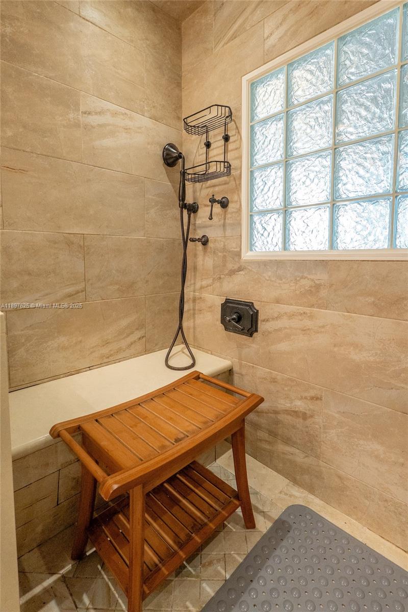 11851 Northwest 7th Street Plantation, FL 33325 - Photo 40 of 72 a bathroom with a table and a shower