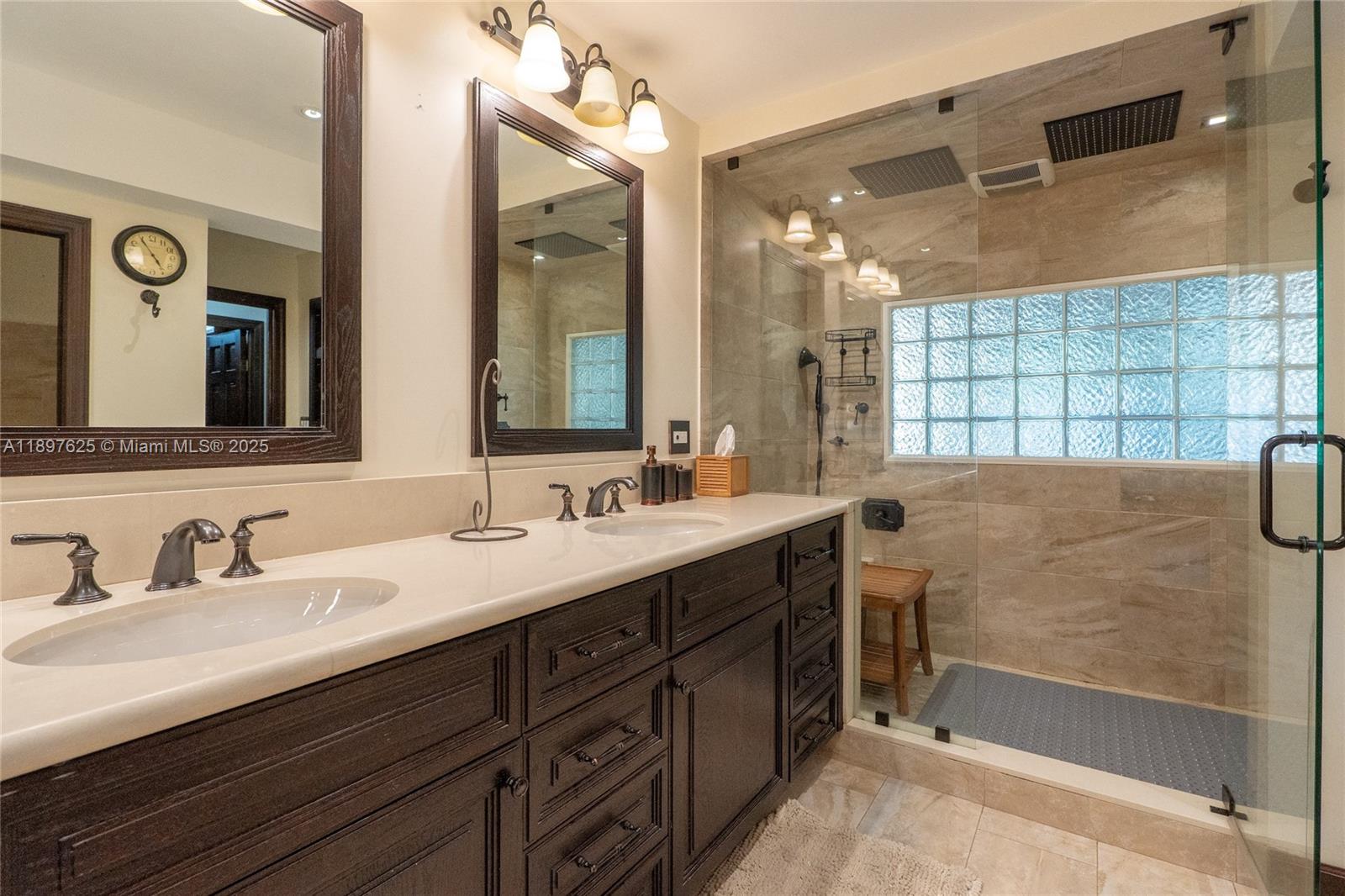 11851 Northwest 7th Street Plantation, FL 33325 - Photo 41 of 72 a bathroom with a double vanity sink mirror and double