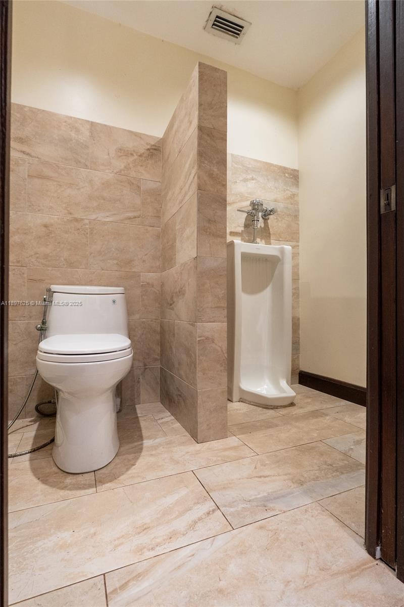 11851 Northwest 7th Street Plantation, FL 33325 - Photo 42 of 72 a bathroom with a sink and toilet