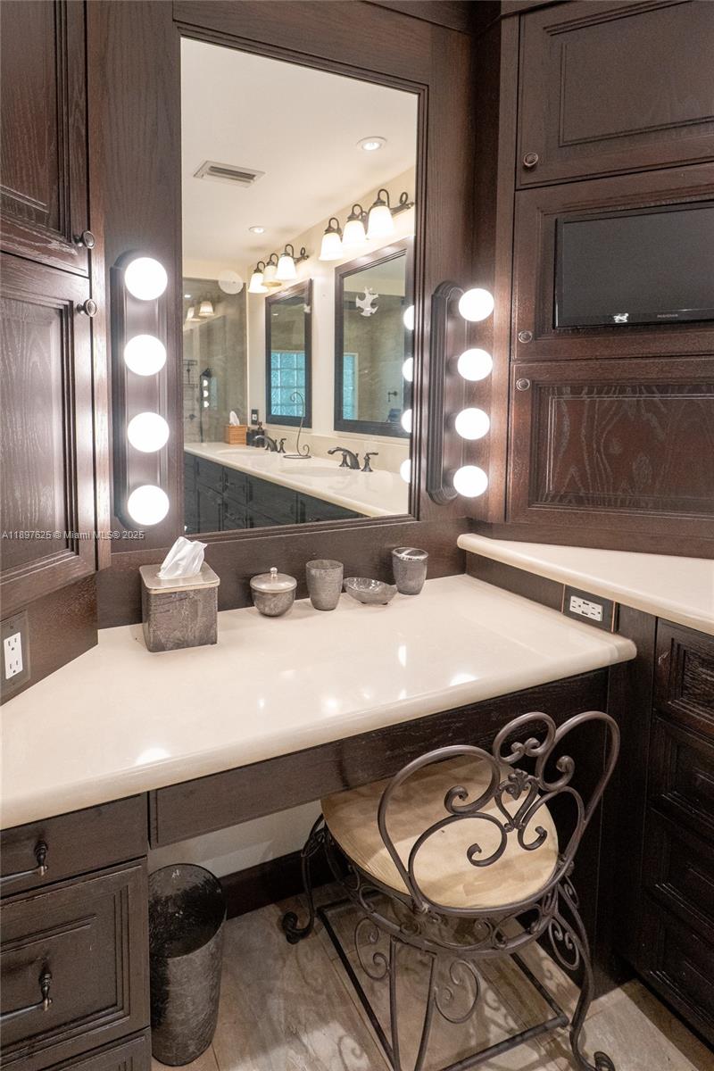 11851 Northwest 7th Street Plantation, FL 33325 - Photo 43 of 72 a bathroom with a sink and a mirror