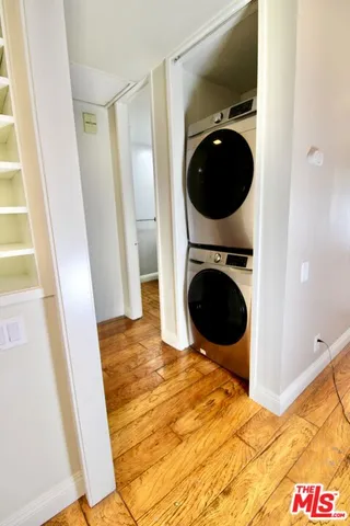 a bathroom with a toilet a sink and a mirror