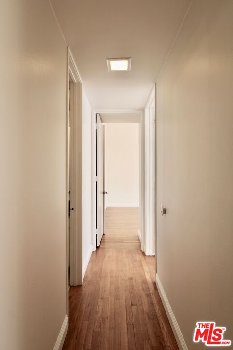 1825 Thayer Avenue Los Angeles, CA 90025 - Photo 19 of 38 a view of hallway with wooden floor