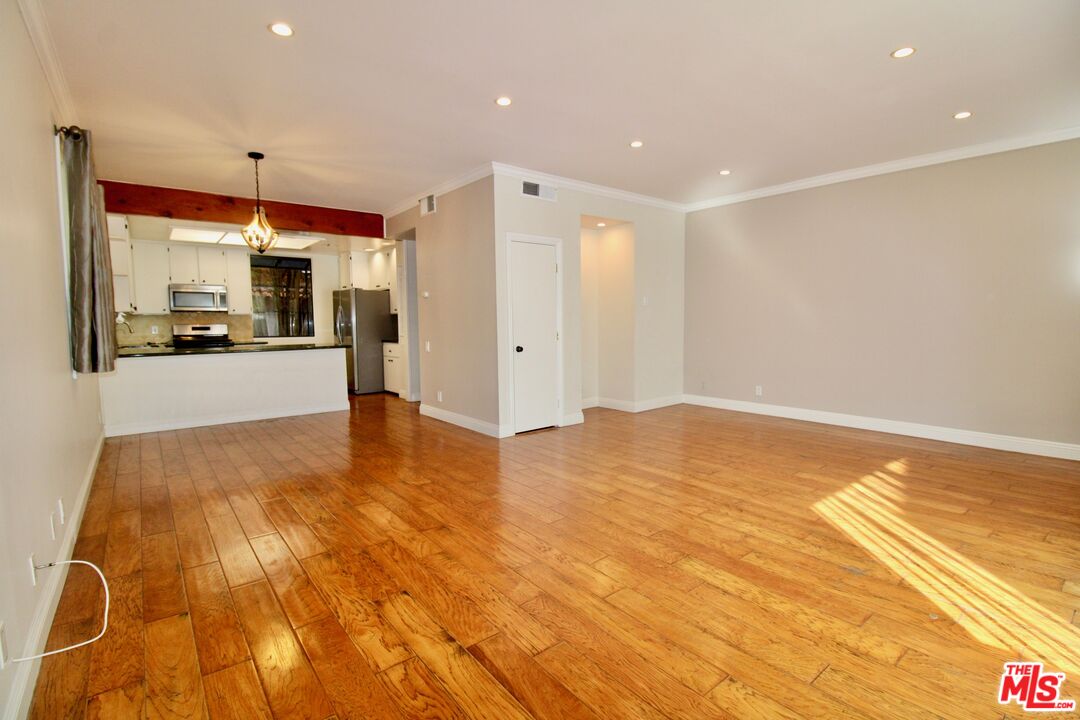 1825 Thayer Avenue Los Angeles, CA 90025 - Photo 3 of 38 a view of a livingroom with a fireplace
