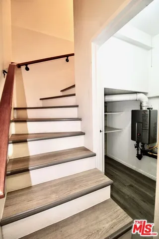 a bathroom with a tub and a shower
