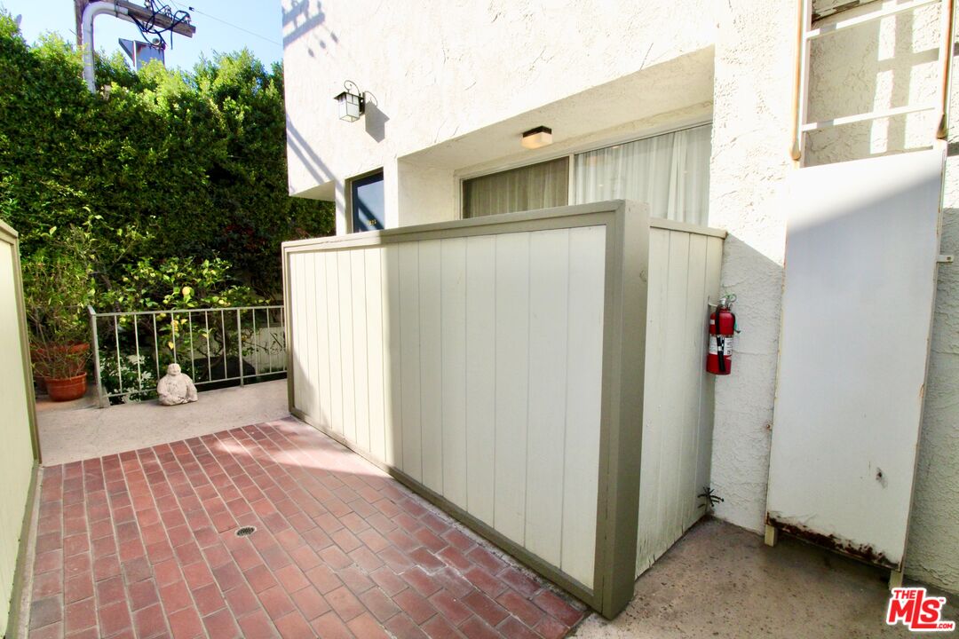 1825 Thayer Avenue Los Angeles, CA 90025 - Photo 38 of 38 a view of a house with wooden walls