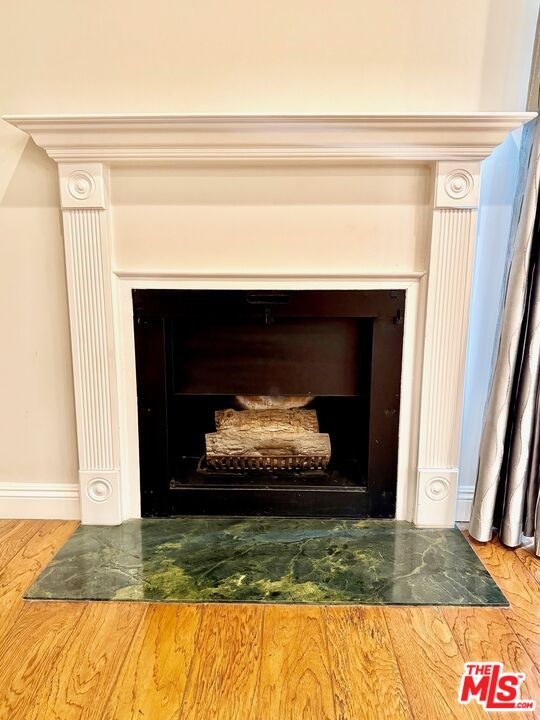 1825 Thayer Avenue Los Angeles, CA 90025 - Photo 6 of 38 a view of fireplace and utility room