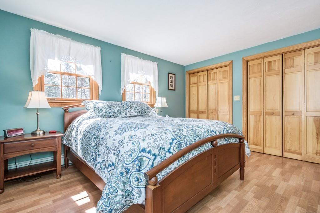 16 South Shaker Road Harvard, MA 01451 - Photo 15 of 31 a bedroom with a bed and a window
