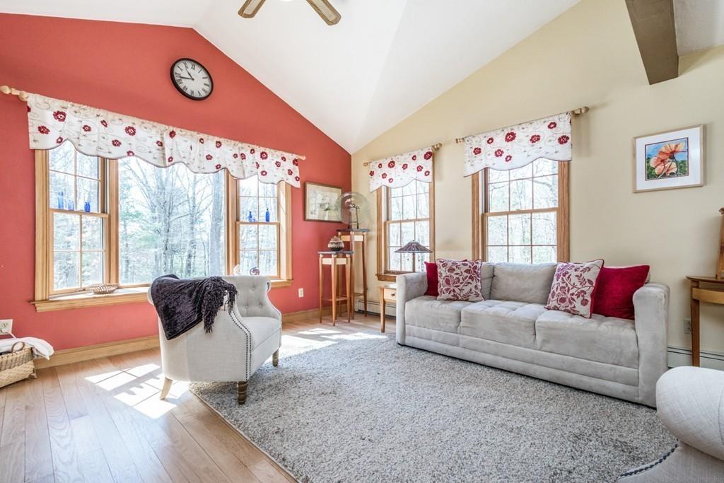 16 South Shaker Road Harvard, MA 01451 - Photo 8 of 31 a living room with furniture and large windows