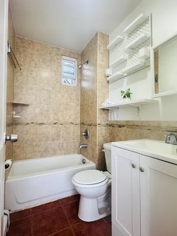 a bathroom with a sink a toilet and a bathtub