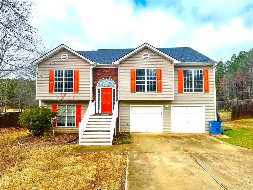 501 Wall Road Statham, GA 30666 - Photo 1 of 1 a front view of a house with a yard
