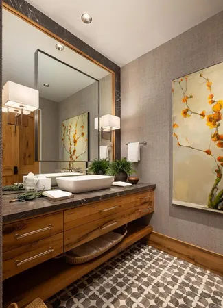 a bathroom with a double vanity sink and a mirror