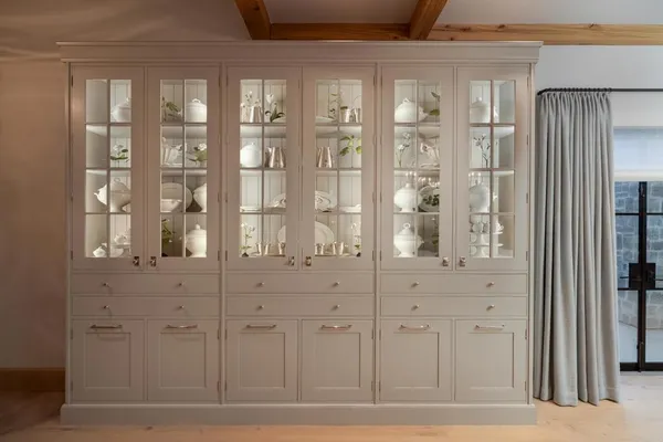 a bathroom with a glass door shower