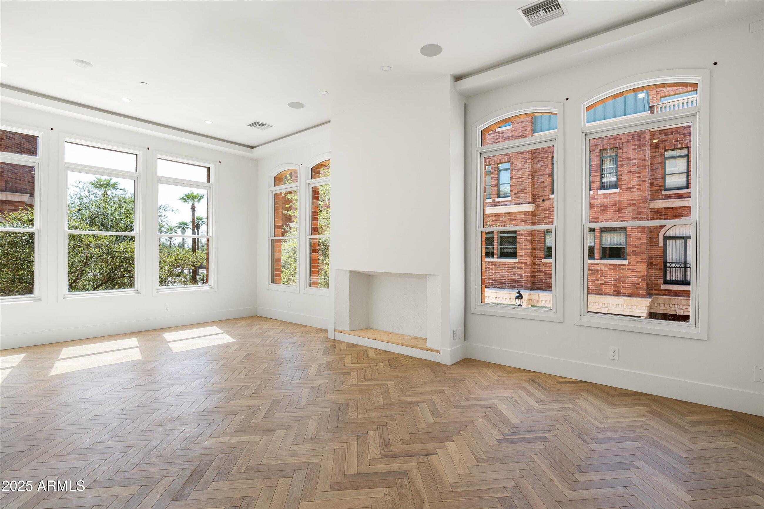 54 West Palm Lane, Unit 54 Phoenix, AZ 85004 - Photo 19 of 31 a view of an empty room with a window