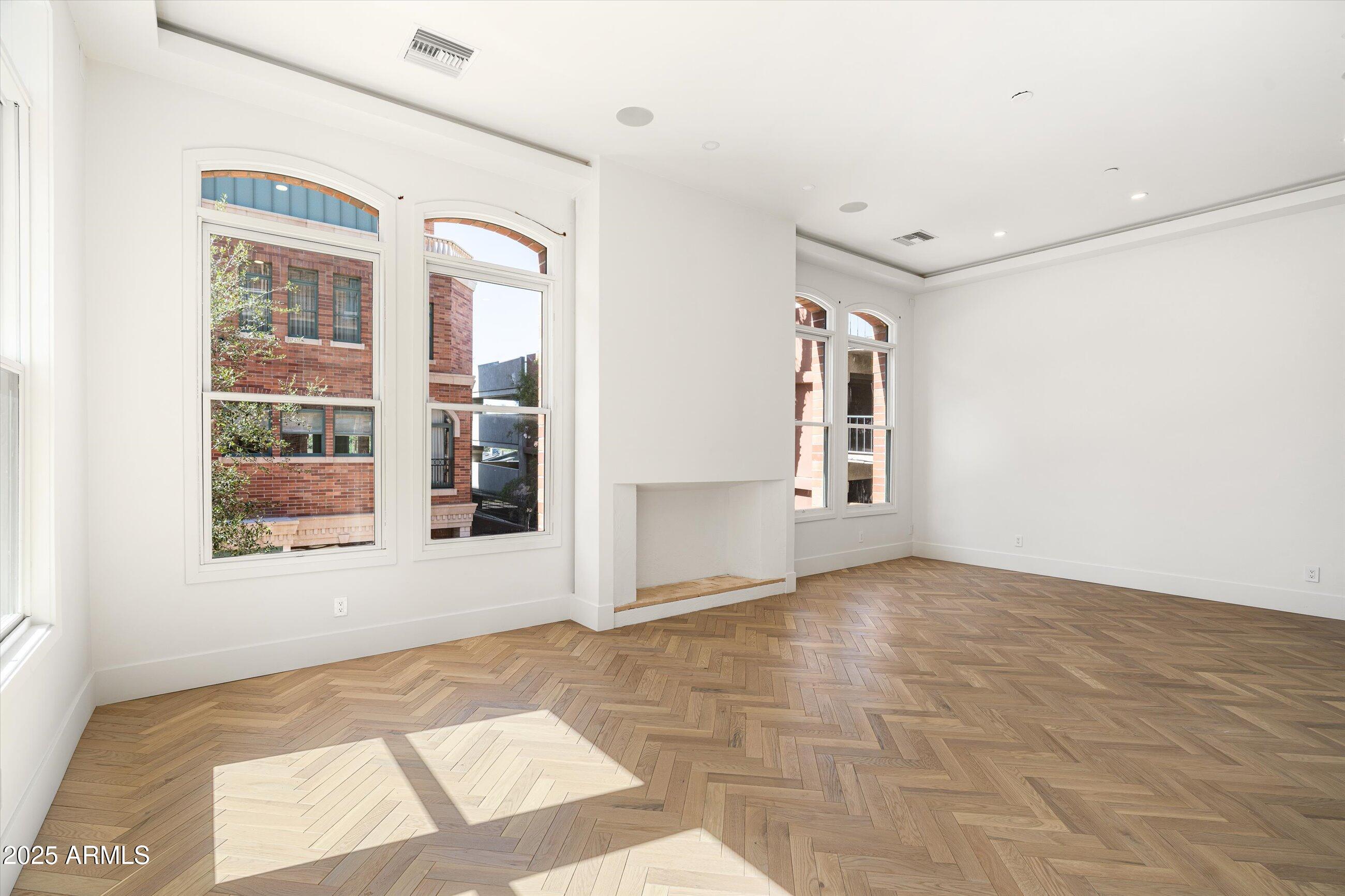 54 West Palm Lane, Unit 54 Phoenix, AZ 85004 - Photo 20 of 31 a view of an empty room with a window