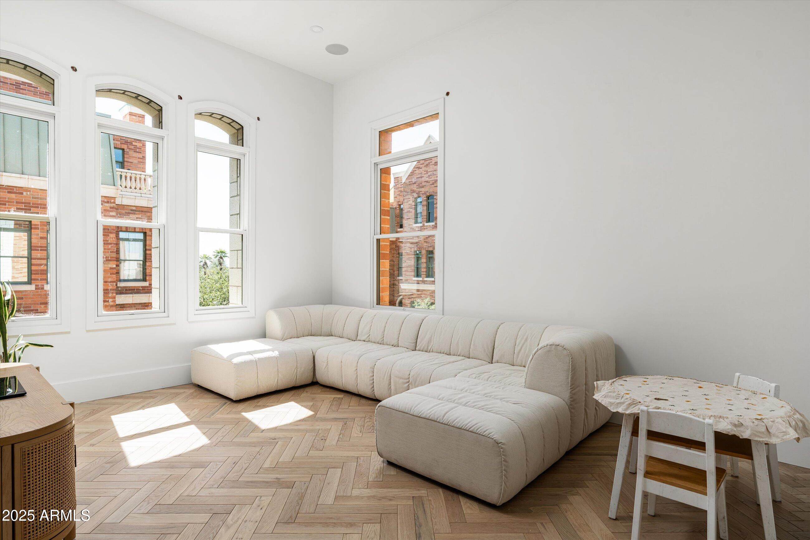 54 West Palm Lane, Unit 54 Phoenix, AZ 85004 - Photo 21 of 31 a living room with furniture and a window