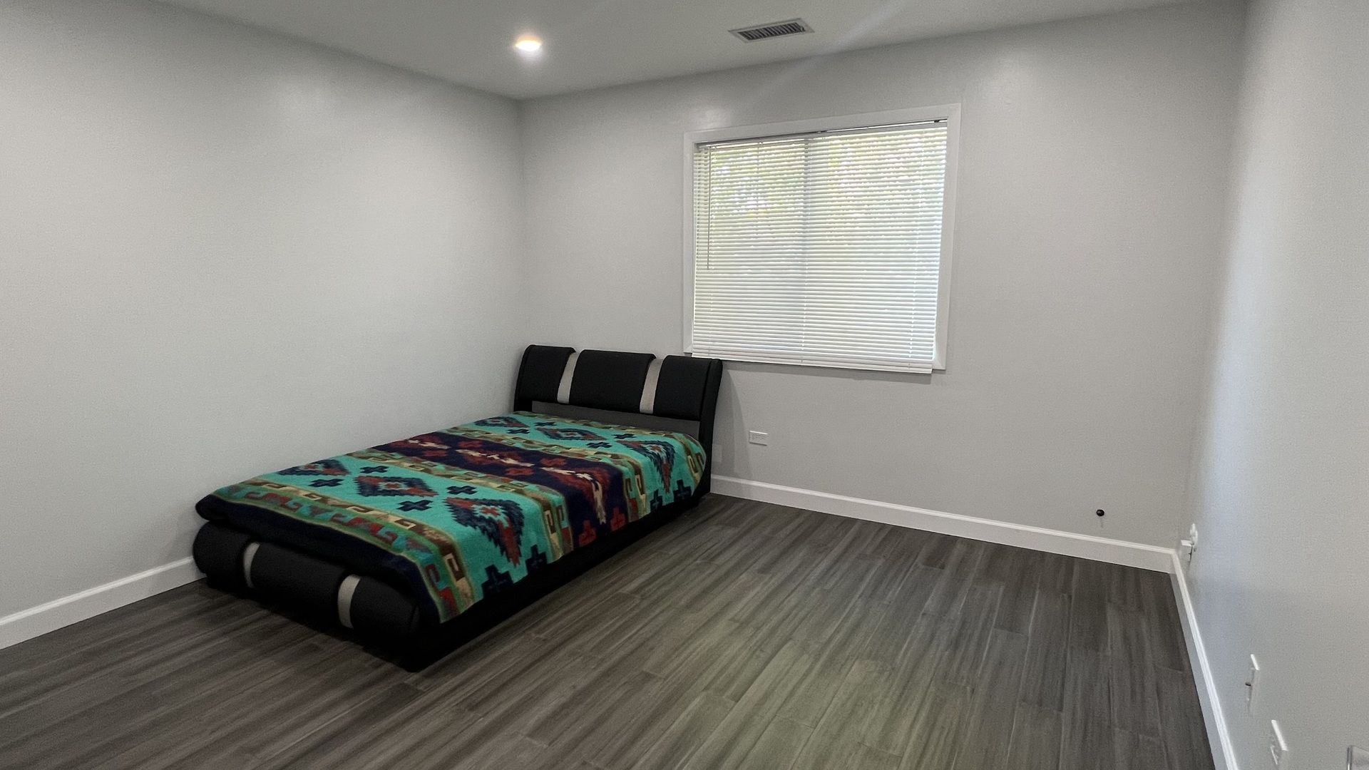 121 Windsor Lane, Unit D Willowbrook, IL 60527 - Photo 12 of 23 a bedroom with a bed and a window