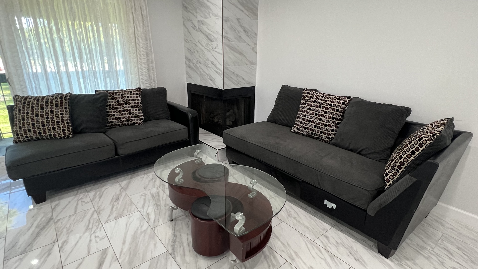 121 Windsor Lane, Unit D Willowbrook, IL 60527 - Photo 7 of 23 a living room with furniture and a large window