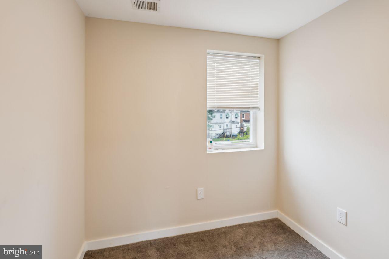 3701 Manchester Avenue Baltimore, MD 21215 - Photo 23 of 34 an empty room with a window