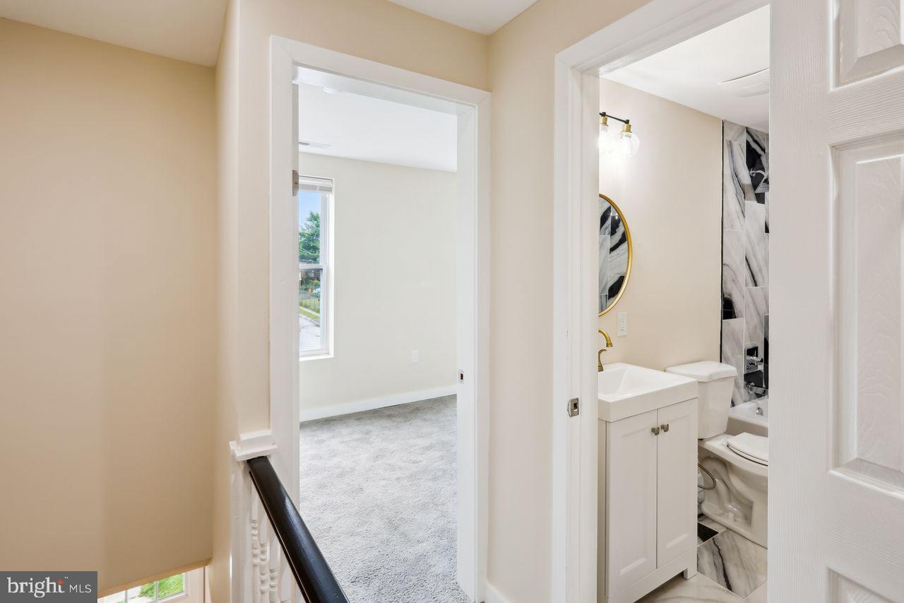 3701 Manchester Avenue Baltimore, MD 21215 - Photo 26 of 34 a view of an entryway with furniture