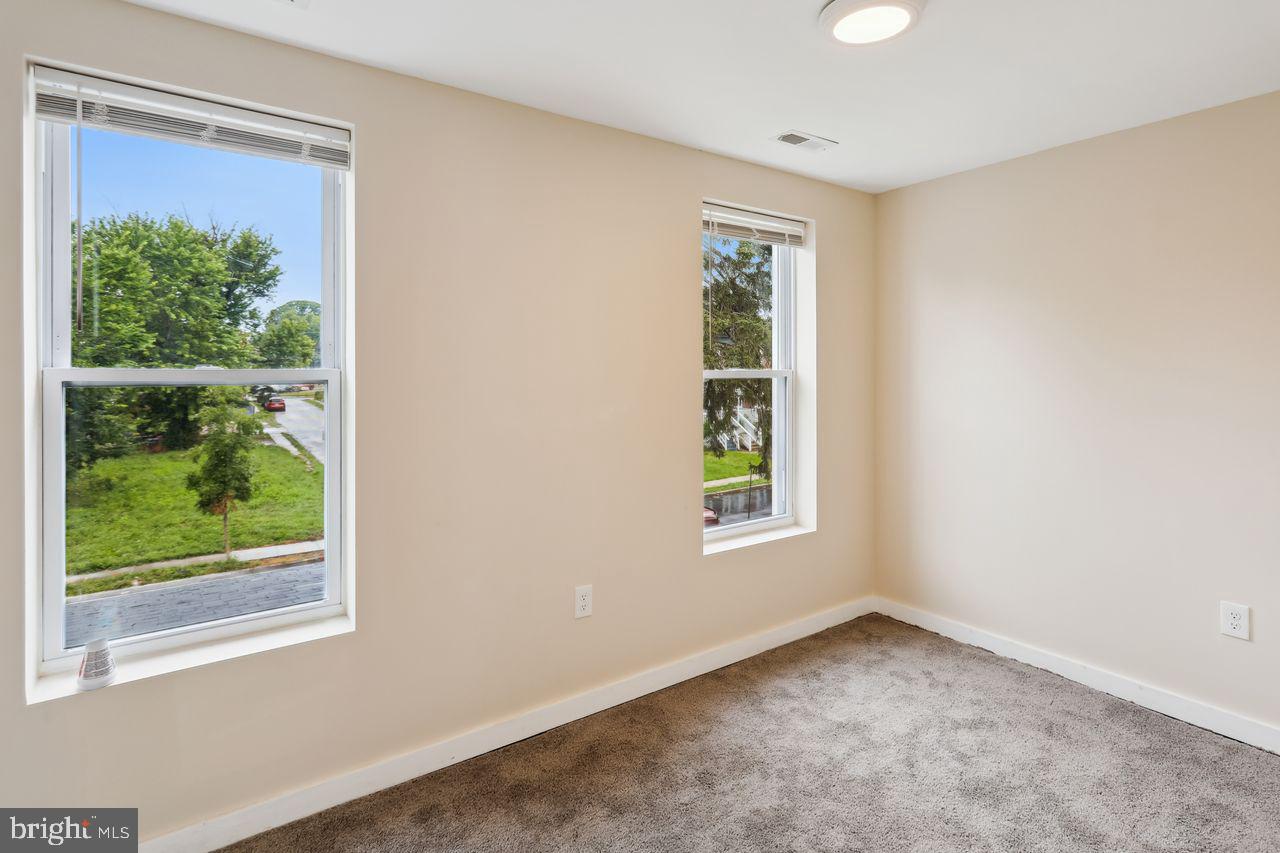 3701 Manchester Avenue Baltimore, MD 21215 - Photo 30 of 34 an empty room with a window