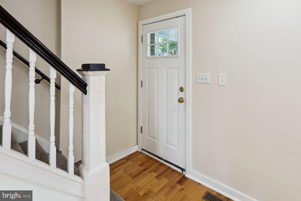 3701 Manchester Avenue Baltimore, MD 21215 - Photo 9 of 34 a view of an entryway with staircase