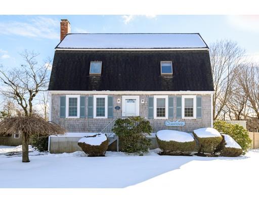 101 Olympia Road Marshfield, MA 02050 - Photo 1 of 24 a front view of a house with a yard