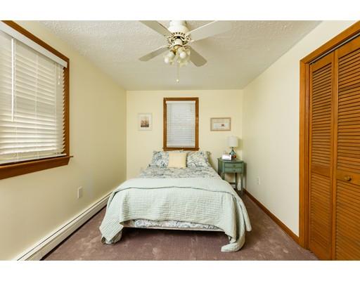 101 Olympia Road Marshfield, MA 02050 - Photo 13 of 24 a bedroom with a bed and window