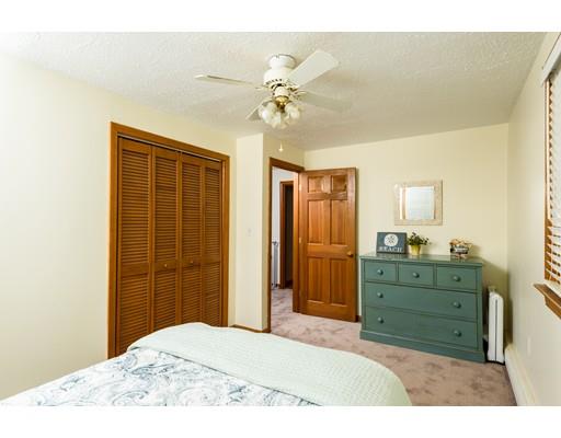 101 Olympia Road Marshfield, MA 02050 - Photo 14 of 24 a bedroom with a bed and a dresser