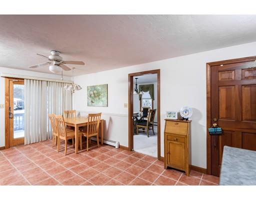 101 Olympia Road Marshfield, MA 02050 - Photo 9 of 24 a view of a livingroom with furniture and window