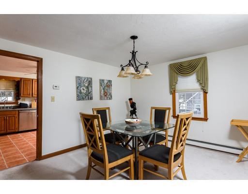 101 Olympia Road Marshfield, MA 02050 - Photo 10 of 24 a view of a dining room with furniture and wooden floor