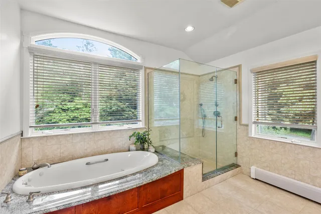 a bed room with a bed and window