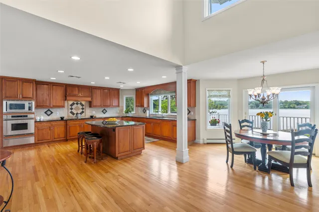 a view of a living room and kitchen