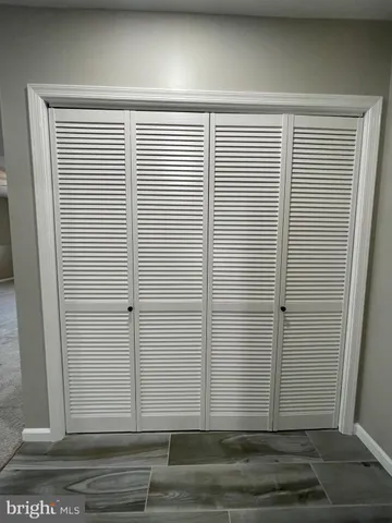 a living room with a couch and a table