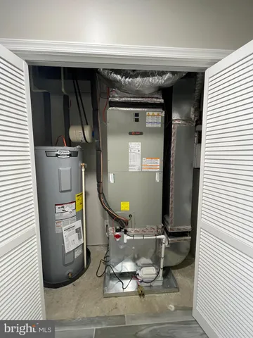 a view of hallway with a rug