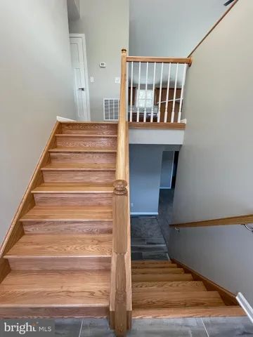 a view of entryway with wooden floor