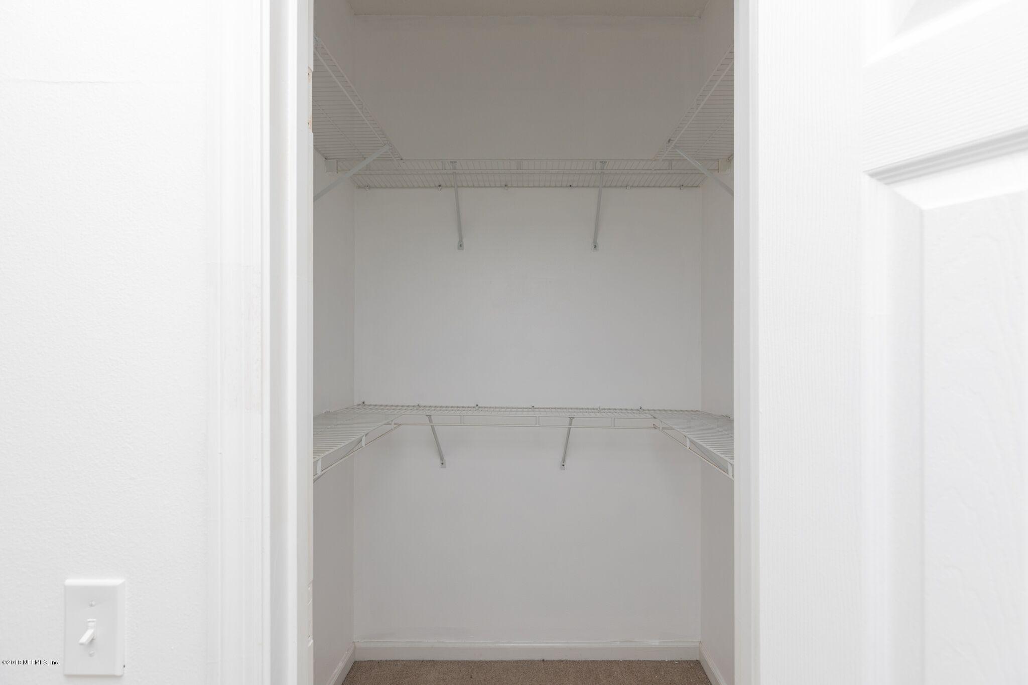 128 Cedar Ridge Circle St. Augustine, FL 32080 - Photo 29 of 37 a view of small space with racks