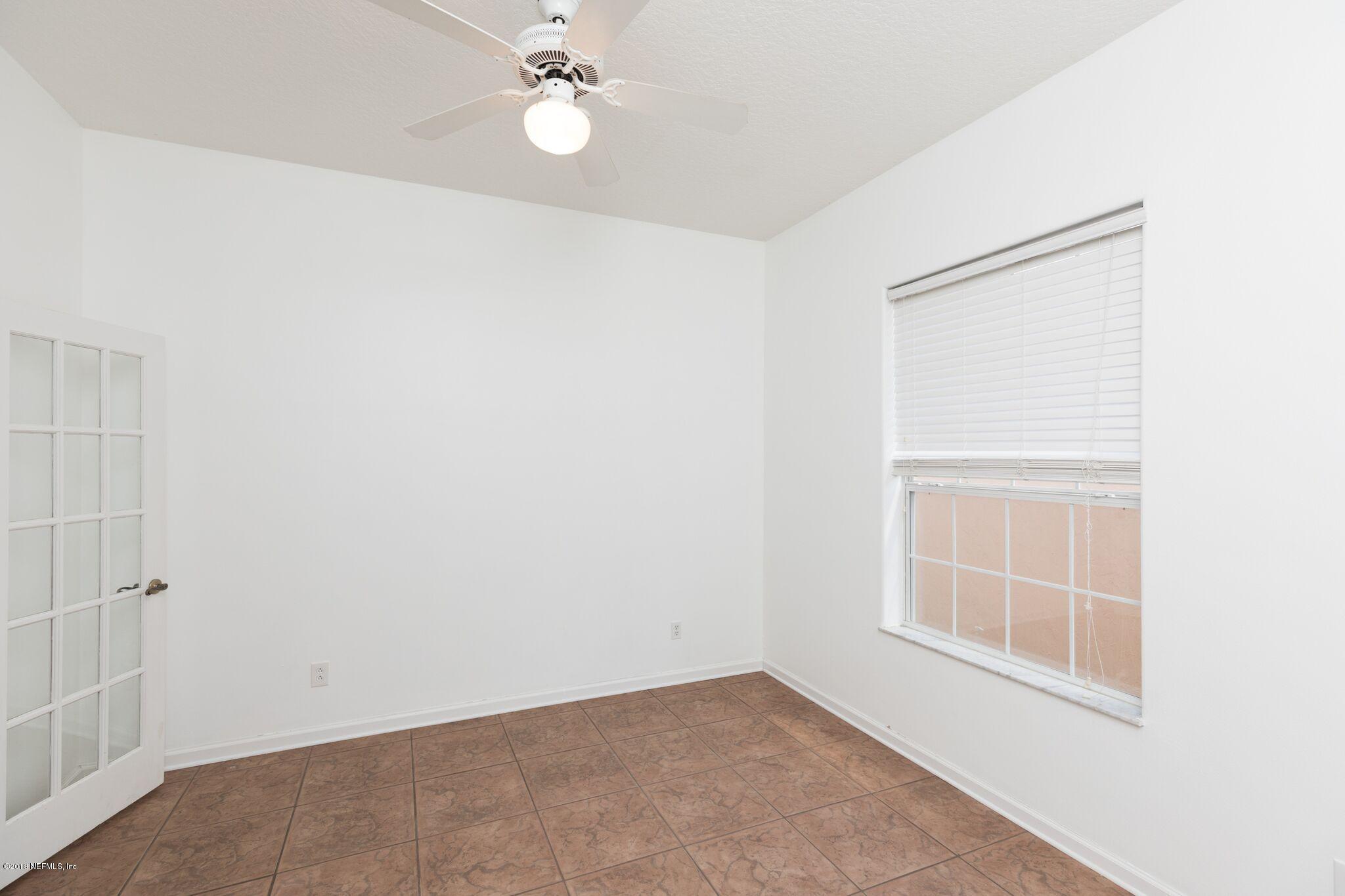 128 Cedar Ridge Circle St. Augustine, FL 32080 - Photo 31 of 37 an empty room with a window