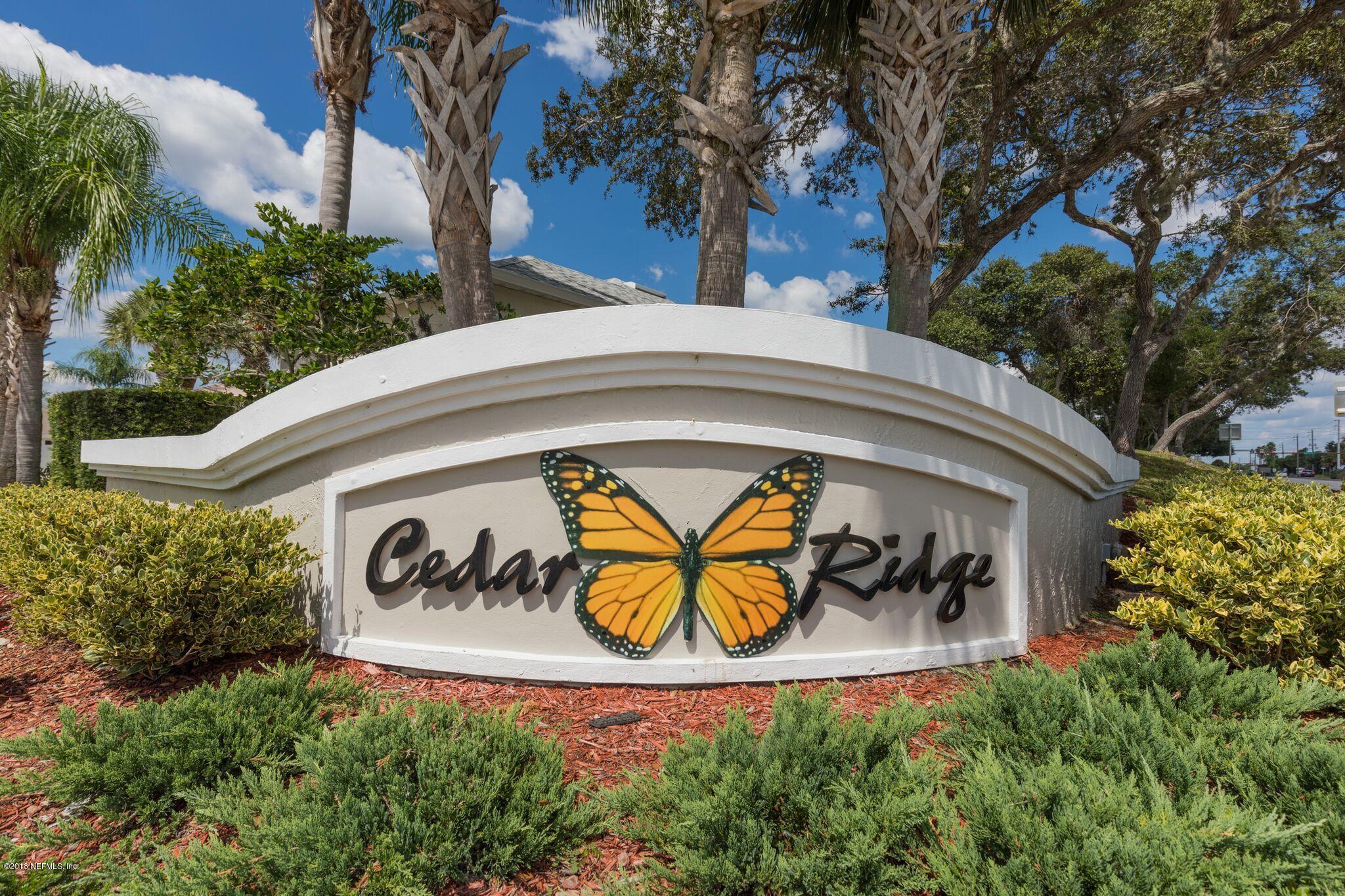 128 Cedar Ridge Circle St. Augustine, FL 32080 - Photo 5 of 37 a sign that is on the side of a building