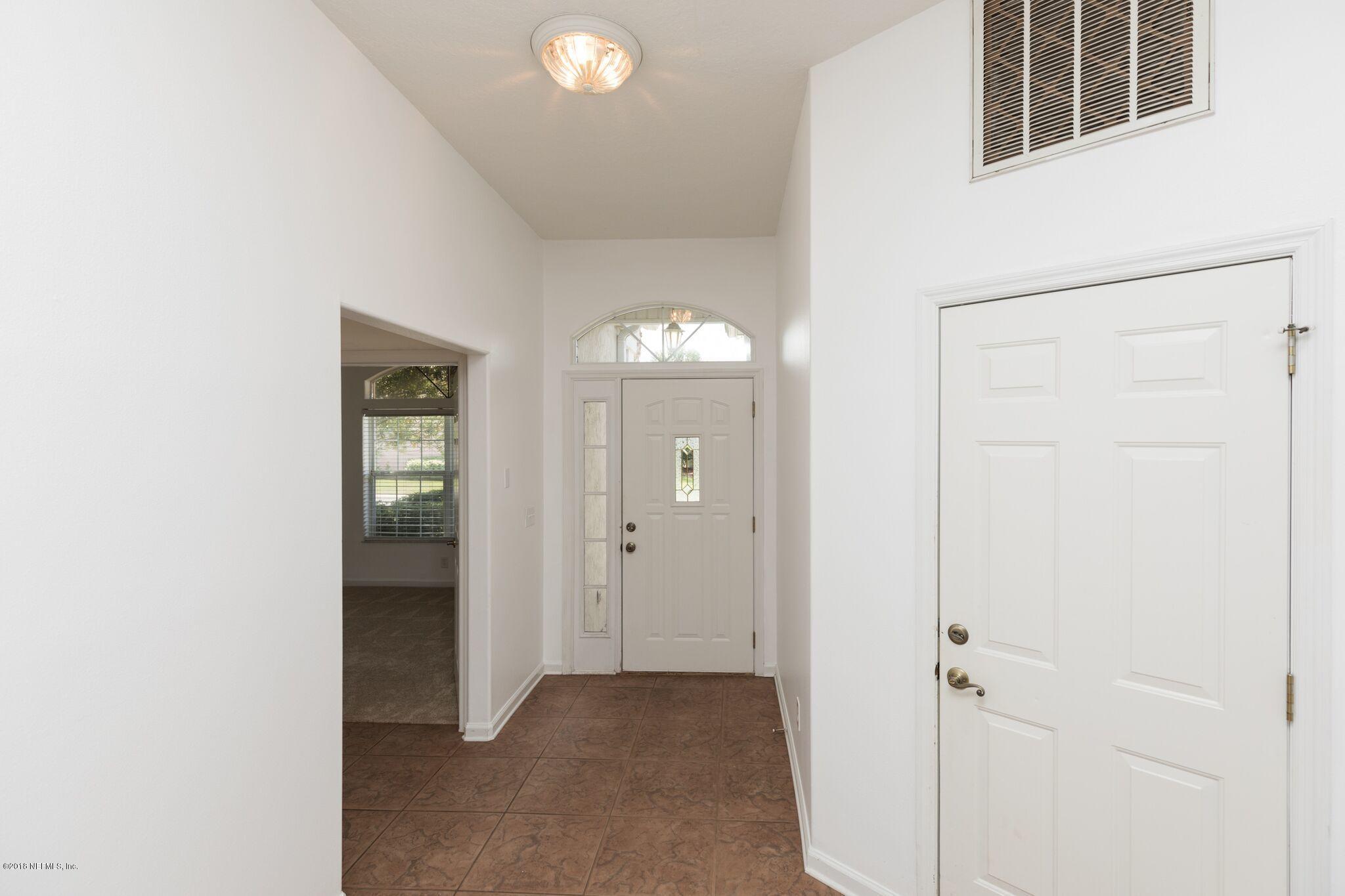 128 Cedar Ridge Circle St. Augustine, FL 32080 - Photo 6 of 37 a view of an empty room