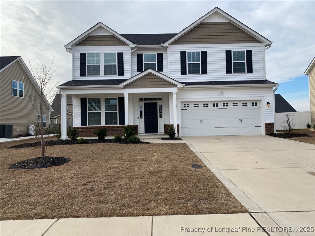 277 Pendleton Street Raeford, NC 28376 - Photo 1 of 29 front view of a house with a yard