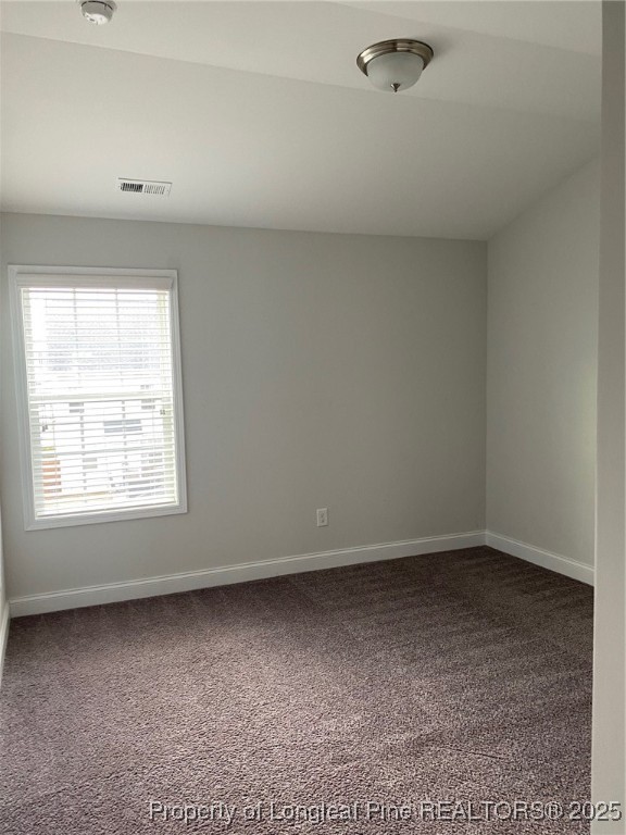 277 Pendleton Street Raeford, NC 28376 - Photo 19 of 29 an empty room with a window