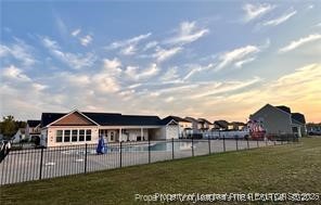 277 Pendleton Street Raeford, NC 28376 - Photo 28 of 29 a view of a house with a big yard and a garden