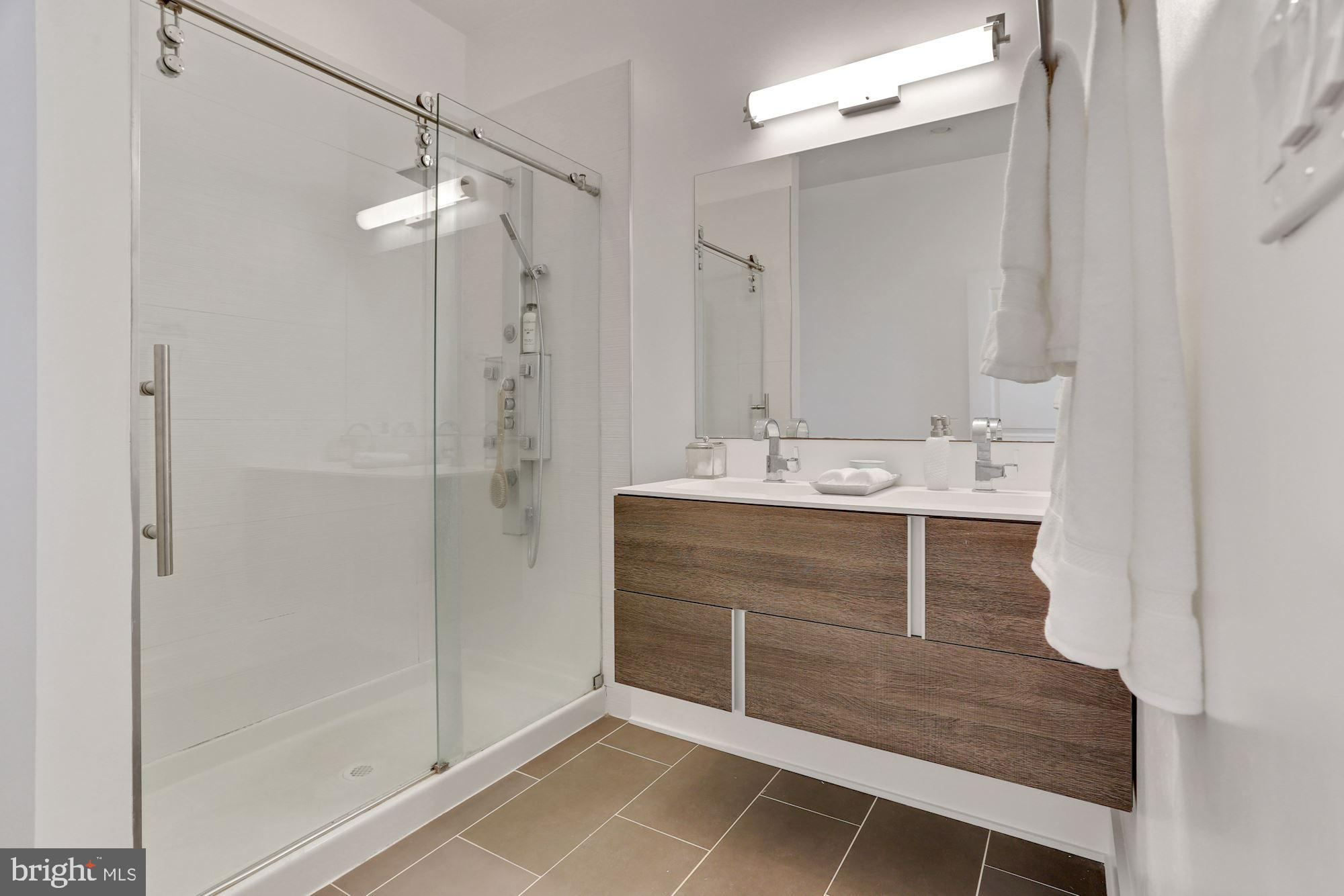 1852 3rd Street Northwest, Unit C Washington, DC 20001 - Photo 16 of 35 Dual sinks, walk-in shower, and high-end finishes
