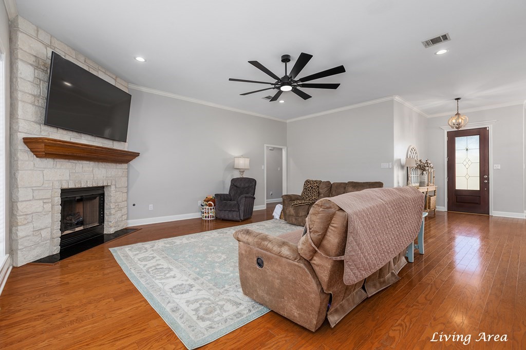 298 Spring Creek Drive Nacogdoches, TX 75965 - Photo 12 of 45 a spacious bedroom with a bed and a fireplace