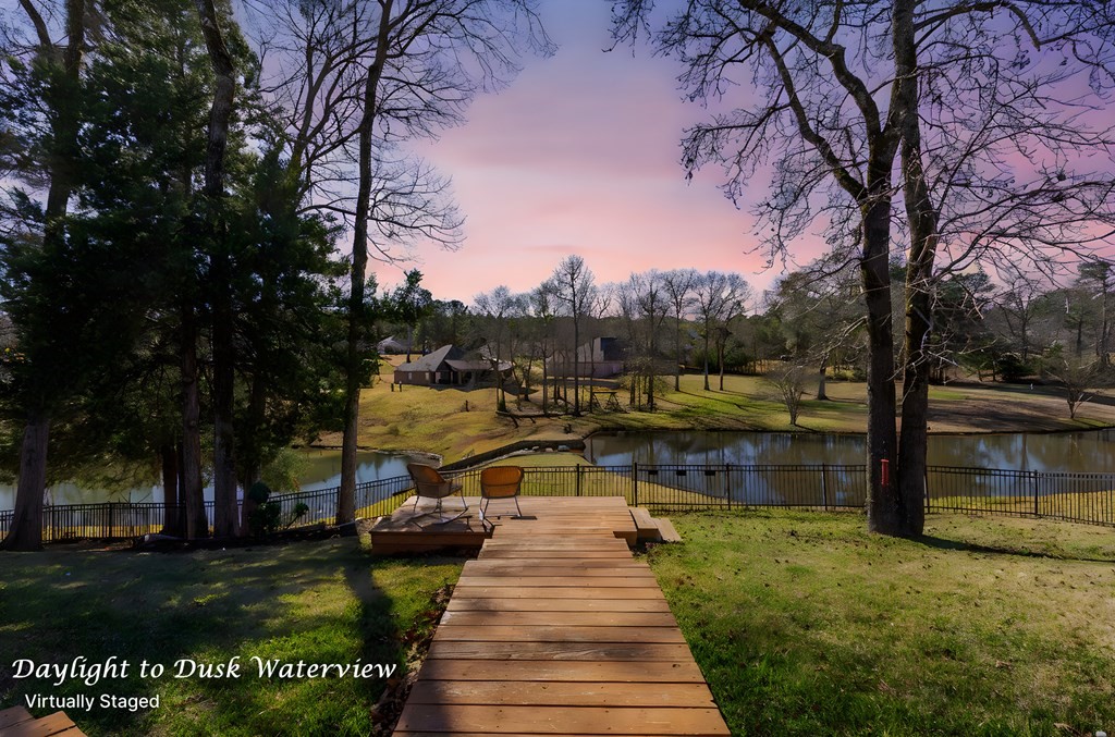 298 Spring Creek Drive Nacogdoches, TX 75965 - Photo 2 of 45 a view of a lake with houses