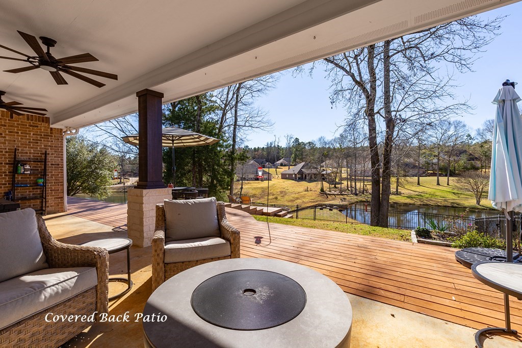 298 Spring Creek Drive Nacogdoches, TX 75965 - Photo 32 of 45 a outdoor space with furniture and garden view