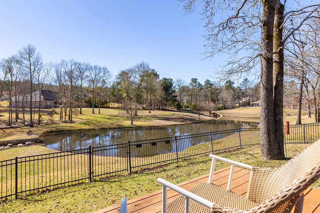 298 Spring Creek Drive Nacogdoches, TX 75965 - Photo 35 of 45 a view of a swimming pool with a lounge chairs