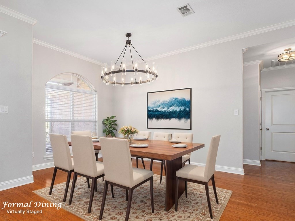 298 Spring Creek Drive Nacogdoches, TX 75965 - Photo 6 of 45 a view of a dining room with furniture window and wooden floor