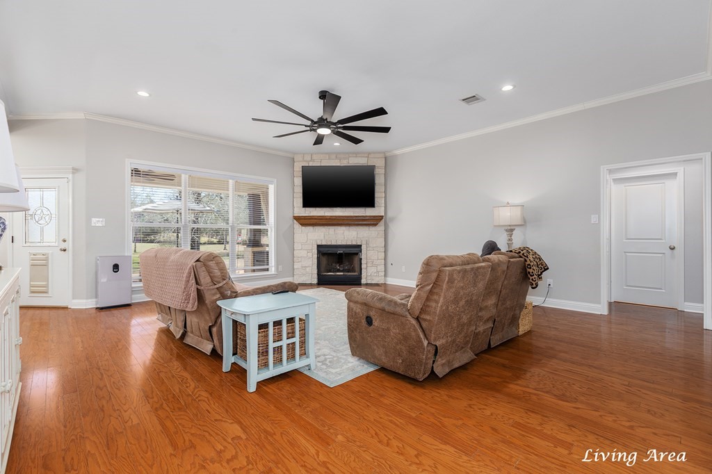 298 Spring Creek Drive Nacogdoches, TX 75965 - Photo 10 of 45 a living room with furniture fireplace and a flat screen tv