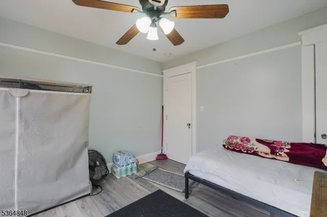 a living room with hard wood floor